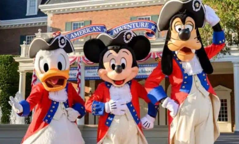 Mickey Mouse, Donald Duck, and Goofy in American attire to celebrate 4th of July in Disney World