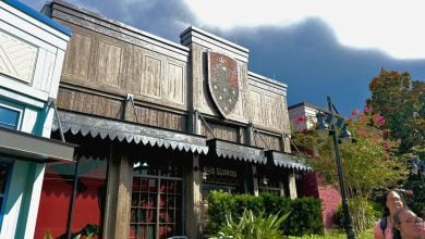 Exterior of Six Ravens restaurant at Disney Springs, featuring the storefront's medieval-inspired design and signage.