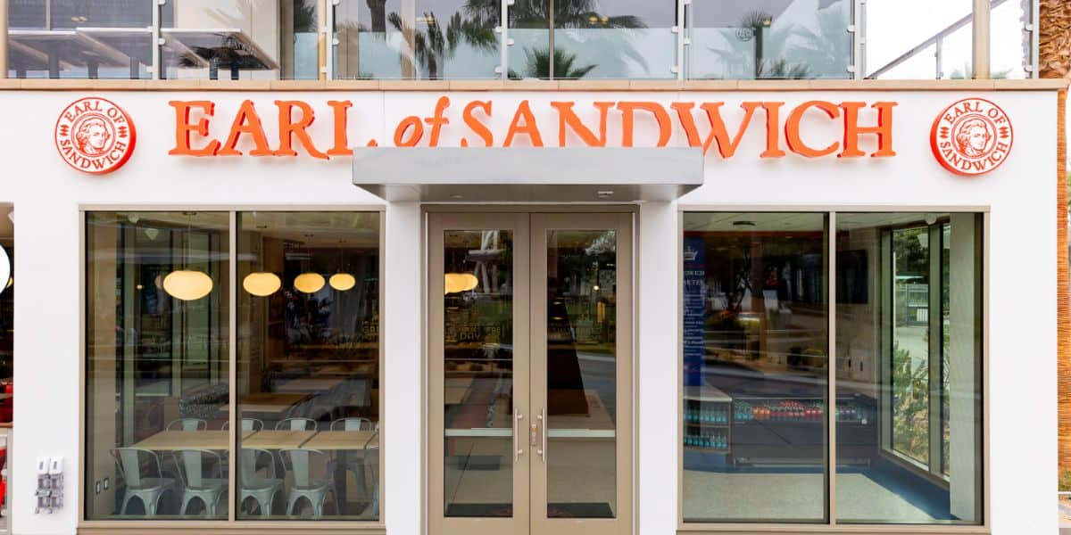 Earl of Sandwich at Downtown Disney, with signature orange sign and big glass windows—a go-to eatery for Disneyland guests.