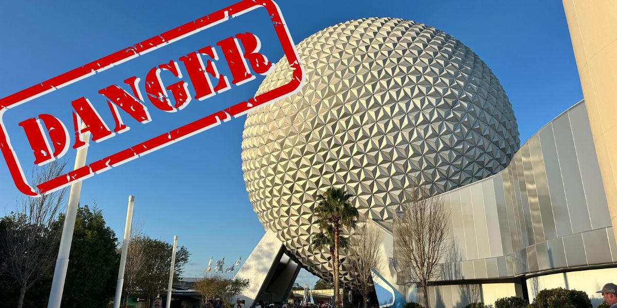 Epcot’s iconic geodesic Spaceship Earth shines under a clear blue sky, dramatically overlaid with a bold red “DANGER” stamp.