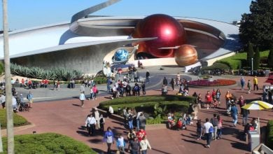 Guests in World Discovery at EPCOT, near MISSON: SPACE