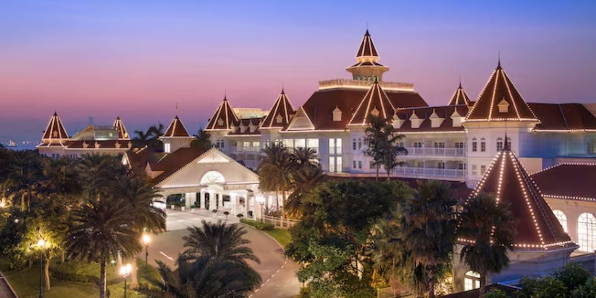 Hong Kong Disneyland Hotel exterior at sunset