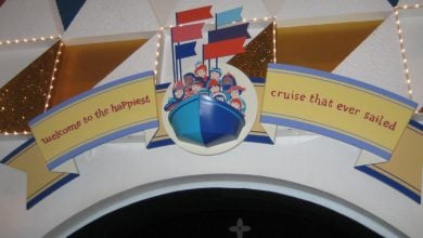 The "welcome to the happiest cruise that ever sailed" sign on "it's a small world" at the Magic Kingdom