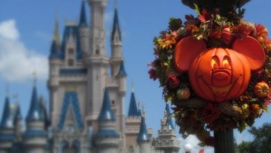 A festive Mickey Mouse pumpkin wreath decorates Main Street, USA, in Magic Kingdom at Walt Disney World for Halloween