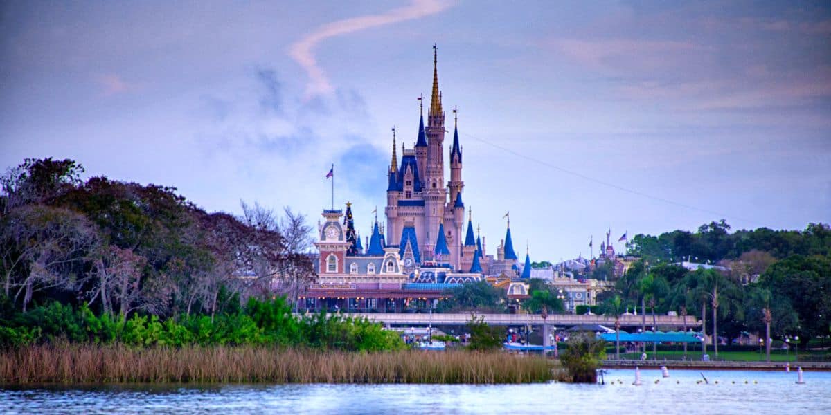 Cinderella Castle and Magic Kingdom Park as seen from a ferryboat on the Seven Seas Lagoon.