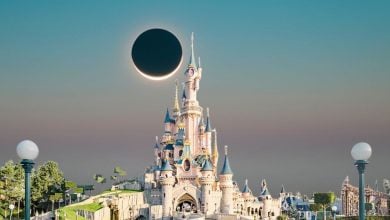 Disneyland Paris eclipse at sunset above Sleeping Beauty Castle on August 12, 2026