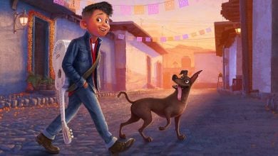 A young visitor carrying a guitar strolls along Main Street, grinning at a delighted Pluto eager for attention.