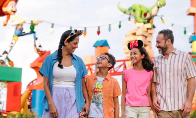 a family at Disney World's Hollywood Studios in Toy Story Land area