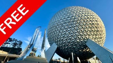 Spaceship Earth at EPCOT, adorned with a vibrant red “FREE Reward” banner on the left, stands tall under a bright blue sky, capturing the festive spirit and energy of Disney World’s Food & Wine Festival.