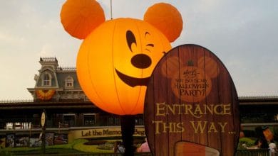 A giant Mickey Mouse pumpkin greets guests by the Halloween party entrance at Magic Kingdom at Walt Disney World Resort
