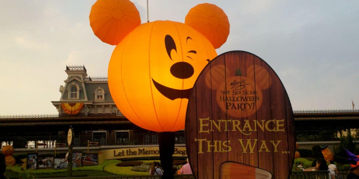 A giant Mickey Mouse pumpkin greets guests by the Halloween party entrance at Magic Kingdom at Walt Disney World Resort