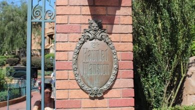 The Haunted Mansion plaque mounted at Magic Kingdom