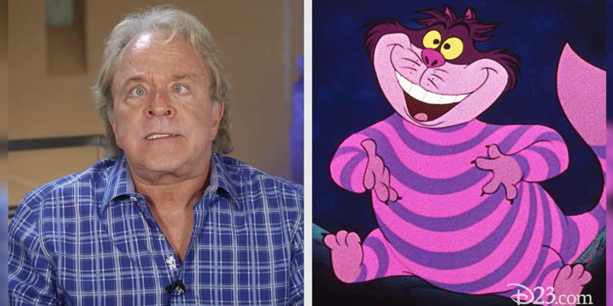 A guest in a blue plaid shirt poses with the whimsical Cheshire Cat from Disney’s “Alice in Wonderland,” the iconic character brought to life by Disney Legend Jim Cummings.