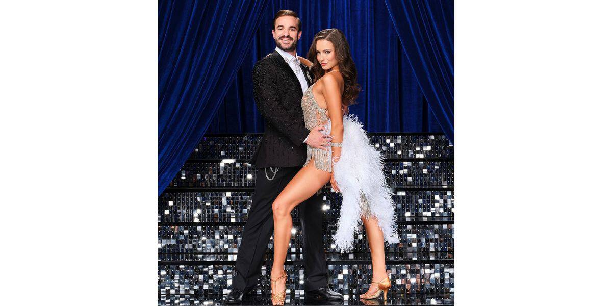 Dancing With The Stars performers strike a dazzling pose in their glittering costumes on the show’s iconic, glimmering stage, framed by shimmering blue curtains, radiating high-energy excitement just before the thrilling Week One Eliminations.