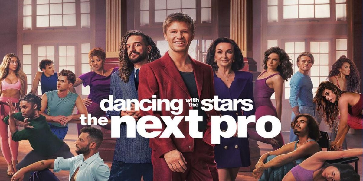 The Dancing with the Stars: The Next Pro cast assembles in the rehearsal studio, striking a show-stopping pose beneath the bold logo as they celebrate making it through Week One Eliminations—capturing all the excitement and drama that fans love about live entertainment.