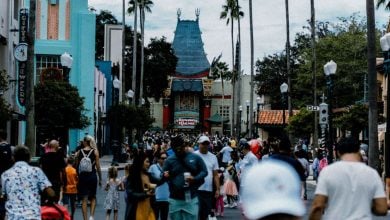 Guests walking toward Mickey & Minnie's Runaway Railway at Disney's Hollywood Studios