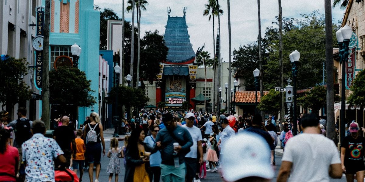 Guests walking toward Mickey & Minnie's Runaway Railway at Disney's Hollywood Studios