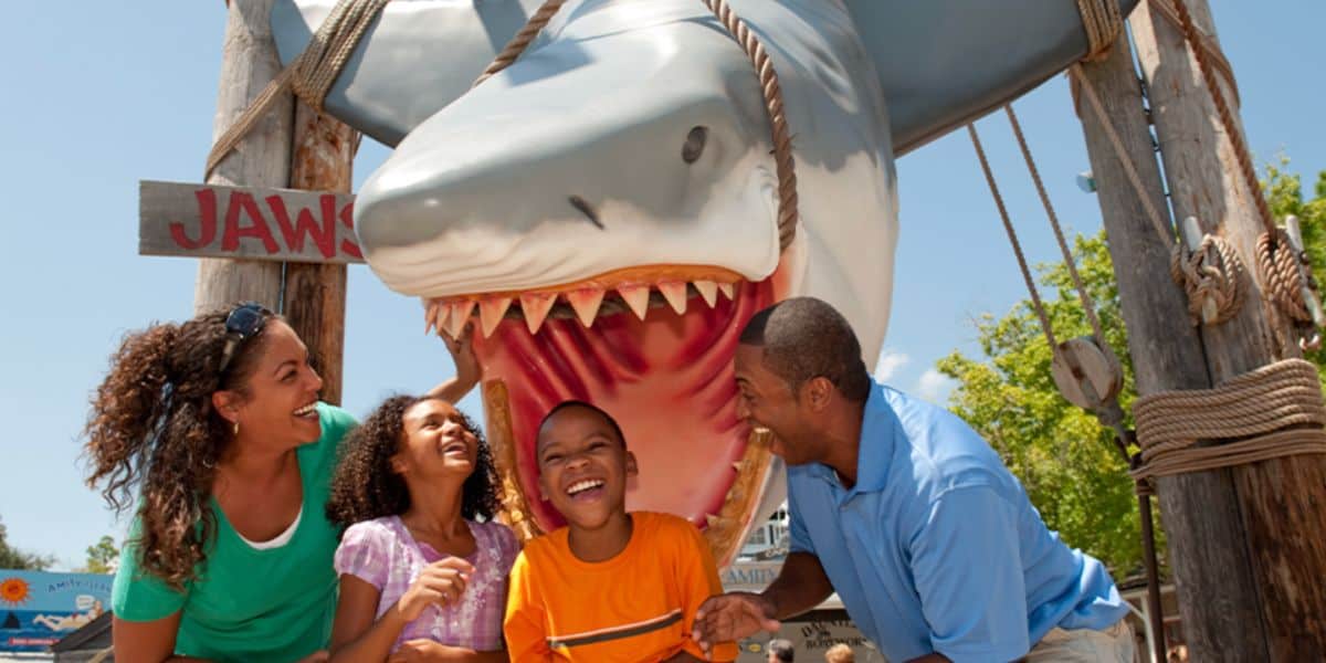 a family takes a picture with JAWS shark at Universal Studios Florida