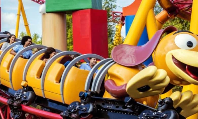 guests ride slinky dog dash in disney world's hollywood studios park
