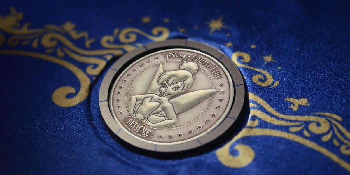 Disney Cruise Line commemorative coin featuring Tinker Bell and the word “Believe.”