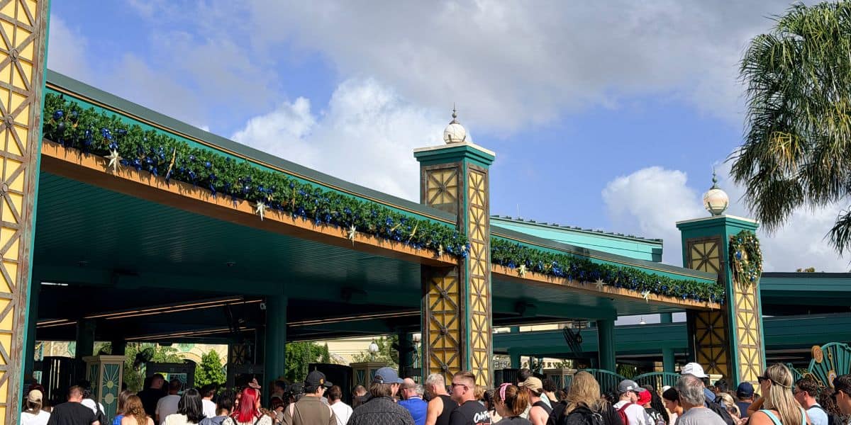 Guests entering Magic Kingdom during the holiday season.