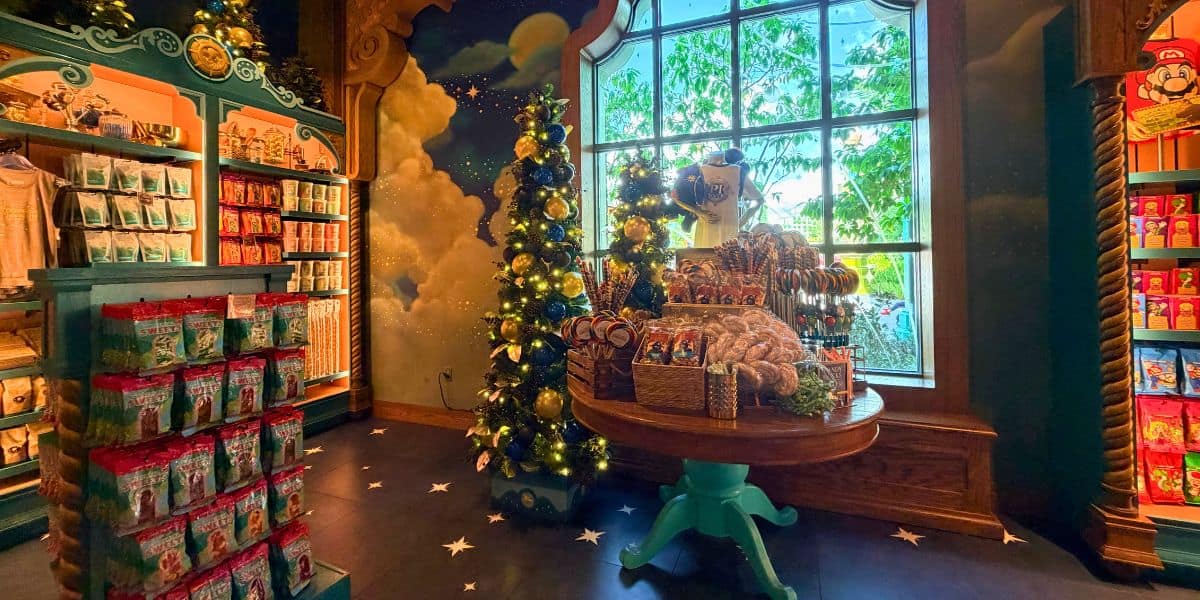 Festive holiday decor and themed candy inside 1-Up Factory at Super Nintendo World.