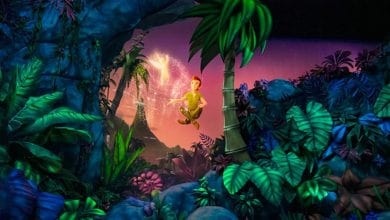 Peter Pan and Tinker Bell flying above the jungle on Peter Pan's Never Land Adventure