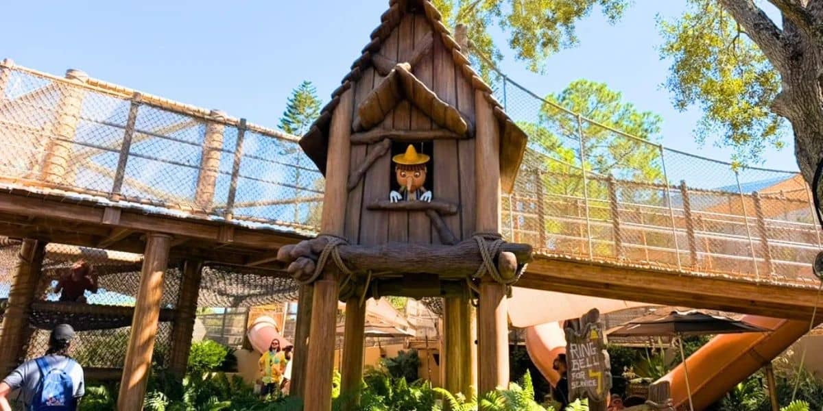 Pinocchio looking out of a window at Shrek's playground in universal orlando's dreamworks land