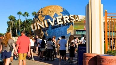 Universal Orlando spinning globe surrounded by guests