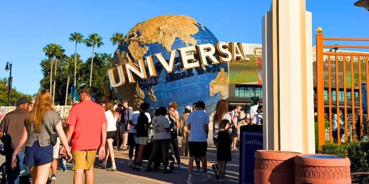 Universal Orlando spinning globe surrounded by guests