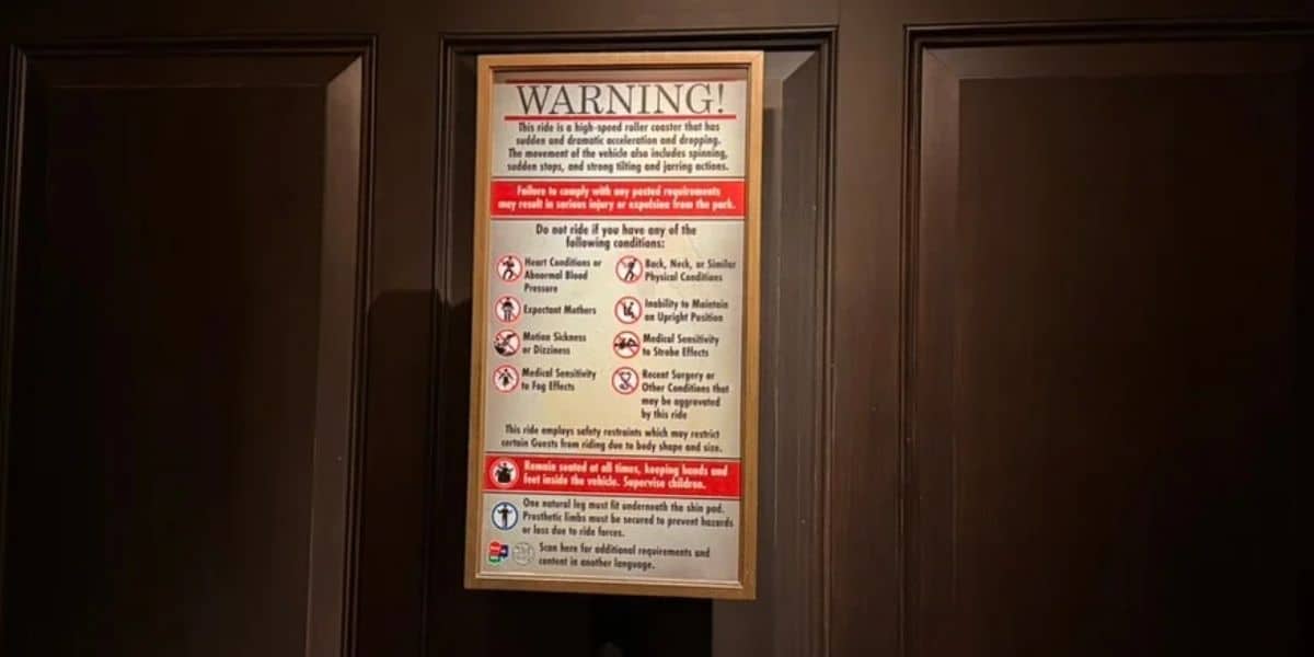 a warning sign for guests with certain conditions and body shapes/sizes at universal orlando ride