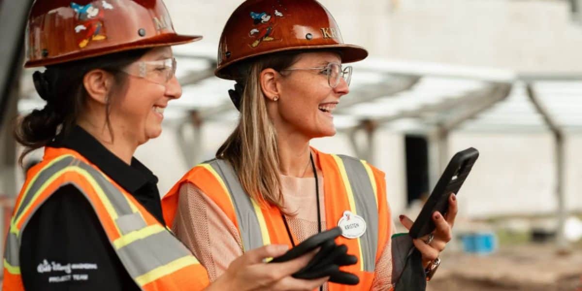 walt disney world imagineers holding cell phones construction